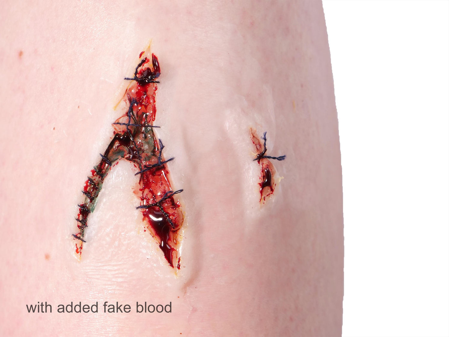 [Item 022: Laceration V-42S] — Pre-Painted Stitched Gash Prosthetic (Encapsulated Silicone)